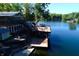 Lakefront home with expansive deck and dock at 7438 Haw Dr, Nineveh, IN 46164
