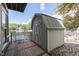 Lakefront property with a spacious shed and deck overlooking the water at 7438 Haw Dr, Nineveh, IN 46164