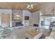 Vaulted ceiling living room with brick fireplace and comfy seating at 7438 Haw Dr, Nineveh, IN 46164