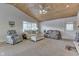Spacious living room with vaulted ceiling and lots of natural light at 7438 Haw Dr, Nineveh, IN 46164