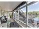 Relaxing screened porch overlooking the lake at 7438 Haw Dr, Nineveh, IN 46164