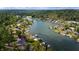 High angle aerial shot of lake houses with piers and docks along the shoreline at 4161 S Summit Ln, Columbus, IN 47201
