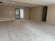 Finished basement featuring sliding glass doors and neutral paint and carpet at 4161 S Summit Ln, Columbus, IN 47201