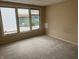 Bedroom with a window offering lake views at 4161 S Summit Ln, Columbus, IN 47201