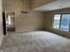 Large bedroom with lake views, neutral decor, and ample closet space, a serene retreat at 4161 S Summit Ln, Columbus, IN 47201