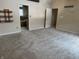 Inviting bedroom featuring ensuite bathroom and large windows at 4161 S Summit Ln, Columbus, IN 47201