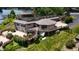 Exterior aerial view of a multi-story home with a large deck and beautifully landscaped yard at 4161 S Summit Ln, Columbus, IN 47201
