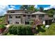 Back of home featuring large deck, patio, and backyard, perfect for entertaining at 4161 S Summit Ln, Columbus, IN 47201