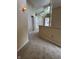 Neutral hallway offering access to various parts of the home at 4161 S Summit Ln, Columbus, IN 47201