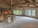 Bright living room with natural light, high ceilings, and seamless flow to the kitchen, perfect for entertaining at 4161 S Summit Ln, Columbus, IN 47201