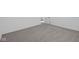 Bedroom with neutral carpeting and light walls leads to an adjacent room through an open door at 5143 Rolling Meadow Blvd, Indianapolis, IN 46237