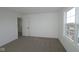 Well-lit bedroom with large window and neutral decor at 5143 Rolling Meadow Blvd, Indianapolis, IN 46237