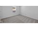 Bedroom showcases neutral carpeting, white walls, natural light through the window at 5143 Rolling Meadow Blvd, Indianapolis, IN 46237