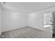 Neutral bedroom with gray carpet and white walls, offering a blank canvas for personalization at 5143 Rolling Meadow Blvd, Indianapolis, IN 46237