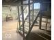 Basement with stairs, offering accessibility and potential for storage or customization in a house at 237 Ringwood Way, Anderson, IN 46013