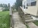 The property has a ramp to the front entrance and a small porch at 237 Ringwood Way, Anderson, IN 46013