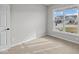Cozy carpeted bedroom with neutral walls and a bright window at 3544 Wrangler Dr, Bargersville, IN 46106