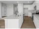 Modern kitchen with stainless steel appliances, sleek countertops, ample cabinet space, and an open layout at 3544 Wrangler Dr, Bargersville, IN 46106