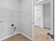 Practical laundry room features wood-look floors and connections at 3544 Wrangler Dr, Bargersville, IN 46106