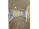 Bright, spacious carpeted bedroom with modern lighting and neutral walls at 11015 Walter Dr, Indianapolis, IN 46235