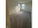 Spacious carpeted bedroom with natural light from two windows, fresh and clean at 11015 Walter Dr, Indianapolis, IN 46235