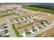 Aerial view of D.R. Horton community with single Gathering homes, sidewalks, and green space at 140 Velvet Hat Rd, Danville, IN 46122