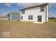 Well-maintained backyard featuring a two-story home and a spacious lawn, great for outdoor activities at 140 Velvet Hat Rd, Danville, IN 46122