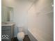 Well-lit bathroom features a shower over the tub and vanity with a mirror at 140 Velvet Hat Rd, Danville, IN 46122