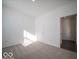 A cozy bedroom with plush carpeting and a white door for a clean, modern aesthetic at 140 Velvet Hat Rd, Danville, IN 46122