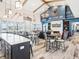 Bright common area with high vaulted ceilings, wood beams, contemporary decor and multiple seating arrangements at 140 Velvet Hat Rd, Danville, IN 46122
