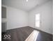 Dining Area featuring hardwood floors and an exterior door at 140 Velvet Hat Rd, Danville, IN 46122