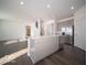 Kitchen featuring an island, stainless steel refrigerator, and gray cabinets at 140 Velvet Hat Rd, Danville, IN 46122