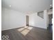 Spacious living room featuring modern hardwood floors and ample natural light at 140 Velvet Hat Rd, Danville, IN 46122