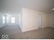 Expansive loft area featuring carpeting, large windows, and multiple areas for comfortable living at 140 Velvet Hat Rd, Danville, IN 46122