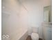 Clean and simple bathroom features a shower-tub combo and vanity with sink at 146 Velvet Hat Rd, Danville, IN 46122