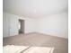 Spacious bedroom featuring neutral carpet, white walls, and a large doorway at 146 Velvet Hat Rd, Danville, IN 46122