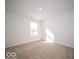 A spacious, light-filled bedroom features a large window and neutral carpeting at 146 Velvet Hat Rd, Danville, IN 46122