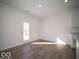 Bright dining room with lots of natural light and view to the kitchen at 146 Velvet Hat Rd, Danville, IN 46122