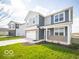 Beautiful two-story home featuring a spacious lawn and a two-car garage at 146 Velvet Hat Rd, Danville, IN 46122