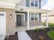 Inviting front entrance of a two-story home, including a covered porch at 146 Velvet Hat Rd, Danville, IN 46122