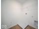 Functional laundry room with modern hookups and vinyl flooring at 146 Velvet Hat Rd, Danville, IN 46122