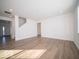 Spacious living room area featuring hardwood floors, ample natural light, and neutral paint at 146 Velvet Hat Rd, Danville, IN 46122