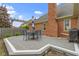 Backyard deck features outdoor dining set and direct access to the yard at 603 Ophelia Dr, Avon, IN 46123
