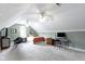 Bright bedroom with vaulted ceilings, dual ceiling fans, and a window for natural light at 603 Ophelia Dr, Avon, IN 46123