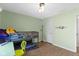 room with wood look floors, bunk beds, nautical accents, and a study desk at 603 Ophelia Dr, Avon, IN 46123