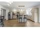 Charming kitchen featuring tile floors, stainless steel appliances, and an island with bar seating at 603 Ophelia Dr, Avon, IN 46123