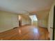 Bedroom with hardwood floors, ceiling fan, and built in storage at 6205 Bramshaw Rd, Indianapolis, IN 46220