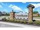 Grantham community entrance sign with stone pillars and landscaping at 15786 Vitalize Run, Fishers, IN 46040