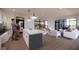 Modern community kitchen and lounge area with hardwood floors at 15786 Vitalize Run, Fishers, IN 46040