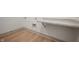 Functional laundry room with a countertop and light wood flooring at 15786 Vitalize Run, Fishers, IN 46040